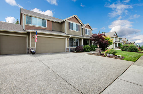 Quickly Improve Exteriors With Expert Driveway Pressure Washing Image